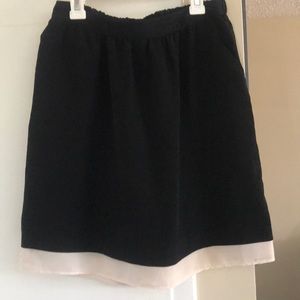 Black skirt (casual or business casual)